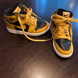 Nike kids Jordan’s. Yellow and Black High-Top Sneakers